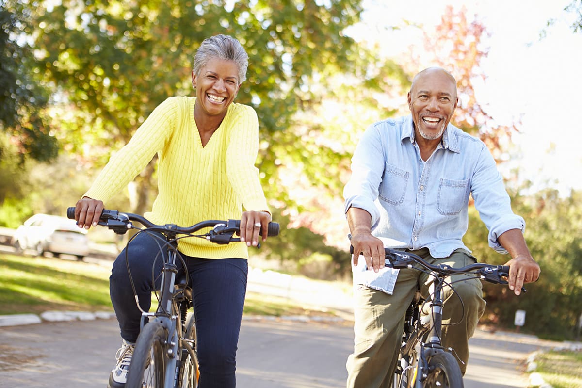 healthy couple riding their bikes