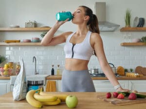 woman maintaining her protein intake with a protein shake