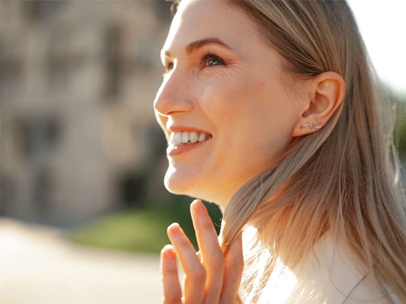 Woman with clear, fresh skin to illustrate the rejuvenating effects of a PRP Facial also known as a Vampire Facial™