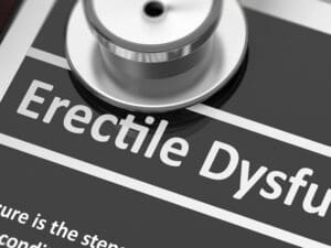 Stethoscope and the words erectile dysfunction to illustrate the correlation between ED and testosterone