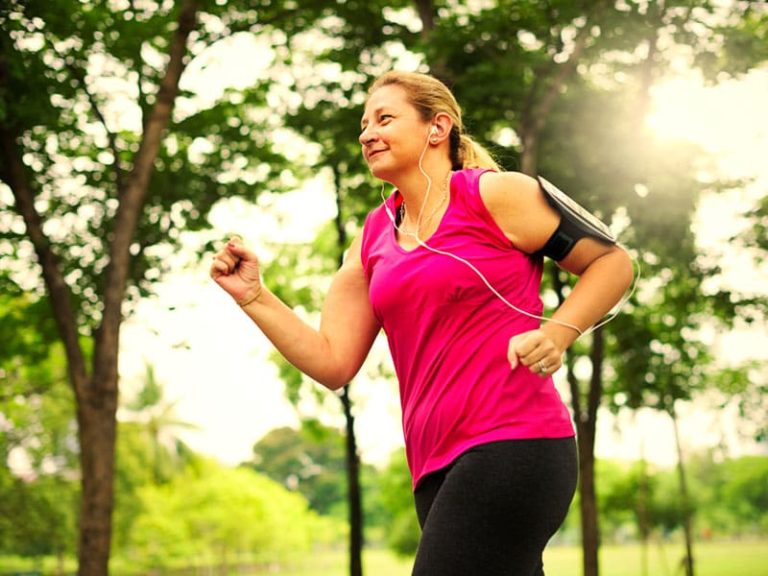 woman jogging, to illustrate healthy exercise supporting how to lose weight after menopause.